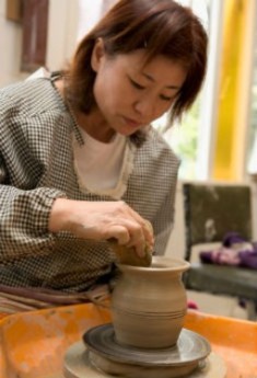 2014-15 Artist-in-Residence throwing a pot