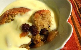 Eve's pudding served with custard